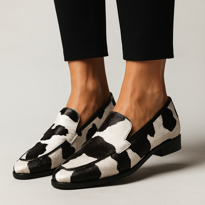 Delilah | Classic Cow Print Loafers with Slip On Design